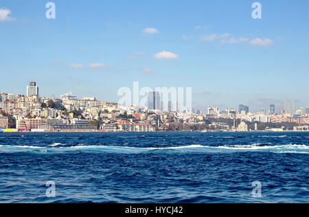 View of Besiktas, Kabatas and Beyoglu areas of Istanbul from Sirkeci ferry station. Irregular urbanization is in the view. Stock Photo