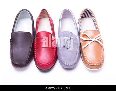 Teen red moccasins on a white isolated background Stock Photo