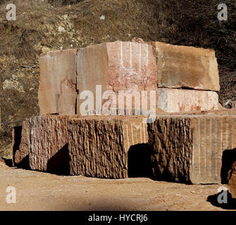 large marble quarry without people with the huge blocks of marble extracted from the mountain Stock Photo