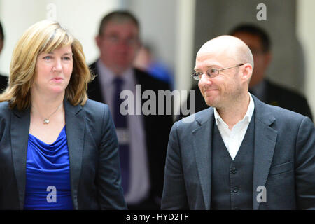 Scottish Green Party co-convener Patrick Harvie and fellow Green MSP Alison Johnstone make their way to the chamber of the Scottish Parliament to listen to First Minister Alex Salmond's statement to MSPs following the Scottish independence referendum and his decision to stand down Stock Photo