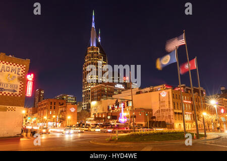 AT&T Building towers over music clubs along lower Broadway in downtown Nashville, Tennessee, USA Stock Photo