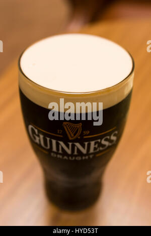 DUBLIN, IRELAND - Pint of Guinness Stout draught beer.