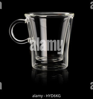 Empty transparent espresso coffee cup on black background Stock Photo