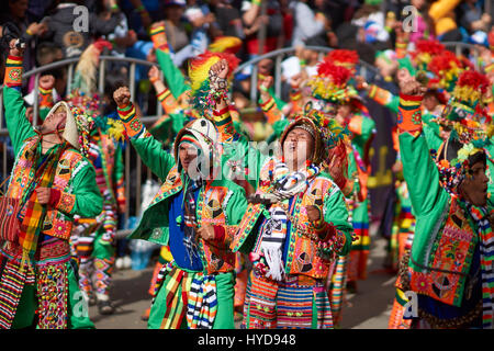 Tinkus dancers in colourful costumes at the annual Oruro Carnival. The event is designated by UNESCO as being Intangible Cultural Heritage of Humanity. Stock Photo
