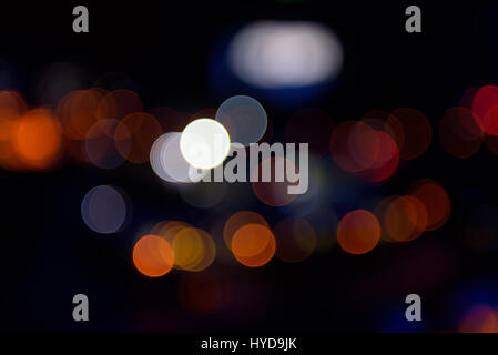 Abstract bokeh background. Multicolored lights on a black background Stock Photo
