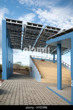 Solar Microgrid. Solar panels form the roof of a multi-use building on Floreana island in the Galapagos Islands, Ecuador Stock Photo