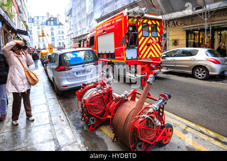 Paris, France - May 20, 2015: firefighters arrived at the emergency call to the cafe Madame des Vosges on the Rue de Birague Stock Photo
