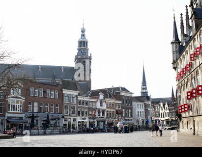 Tower of the 15th century Gothic Sint Jans Kerk or Grote Kerk in the centre of Gouda, South Holland, Netherlands, Seen from Markt square. Stock Photo