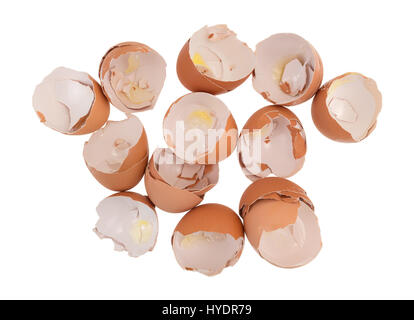 Top view of a dozen cracked open and used egg shells isolated on a white background. Stock Photo