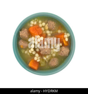 Top view of a bowl filled with Italian style wedding soup isolated on a white background. Stock Photo