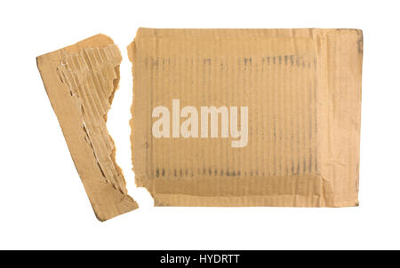A cardboard packaging mailer that has been torn open isolated on a white background. Stock Photo