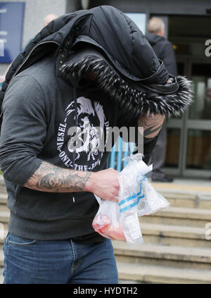 Kyran Evans, 23, leaves Croydon Magistrates' Court, where he is amongst a group charged with violent disorder following a suspected hate crime which left a teenage asylum seeker fighting for his life. Stock Photo