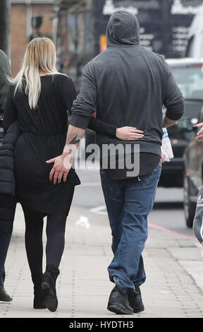 Kyran Evans, 23 (right), leaves Croydon Magistrates' Court, where he is amongst a group charged with violent disorder following a suspected hate crime which left a teenage asylum seeker fighting for his life. Stock Photo