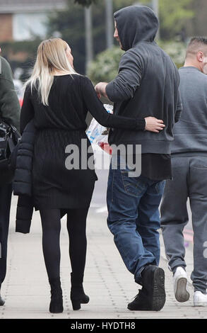 Kyran Evans, 23 (right), leaves Croydon Magistrates' Court, where he is amongst a group charged with violent disorder following a suspected hate crime which left a teenage asylum seeker fighting for his life. Stock Photo