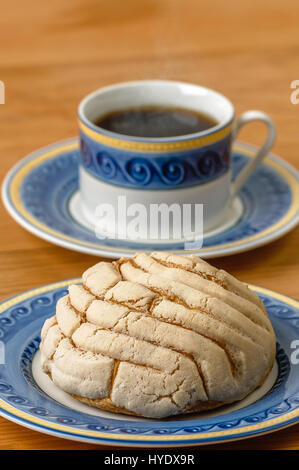 concha mexican bread and coffee cup is a breakfast in mexico city