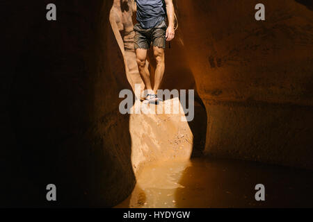 Canyoneering in Blue John Canyon. This is a remote area of Utah called Robbers roost. Stock Photo