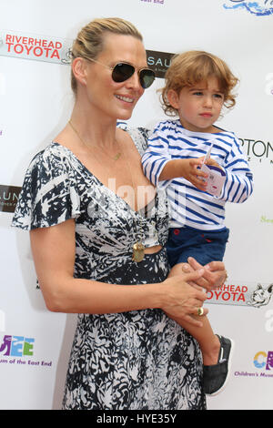 BRIDGEHAMPTON, NY - JULY 19: Molly Sims and son Brooks Alan Stuber at the Children’s Museum of the East End’s (CMEE) 6th Annual Family Fair in Bridgehampton, NY on JUly 19, 2014. Credit: mpi98/MediaPunch Stock Photo