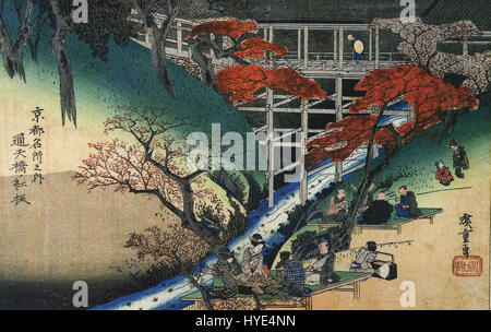 This woodblock print by Hiroshige shows people gathered under the shade of maple trees by a serene stream. The composition reflects the artist’s mastery of nature, capturing tranquil moments in Edo-period Japan with delicate colors and a sense of peacefulness. Stock Photo