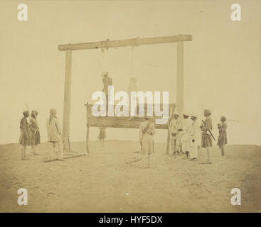 This historical photograph captures the military execution of James ...