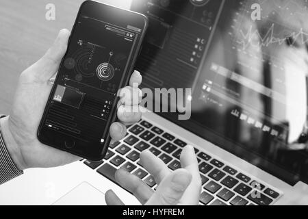 close up of hand using smart phone,laptop, online banking payment communication network technology 4.0,internet wireless application development sync  Stock Photo