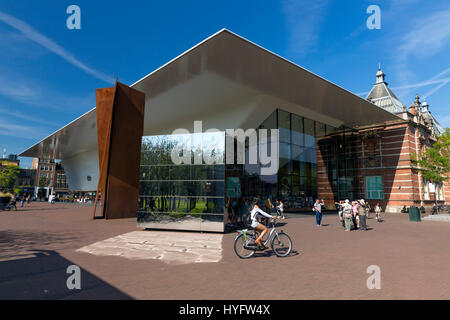 Tourists and visitors outside the Stedelijk Museum of Modern Art in summer sunshine, Amsterdam, Netherlands, Europe Stock Photo