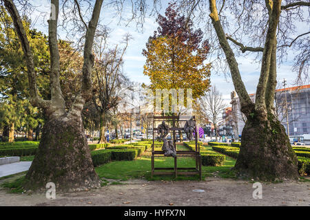 Thirteen Laughing at Each Other - sculptures created by Joan Munoz in Cordoaria Garden in Vitoria civil parish of Porto city in Portugal Stock Photo