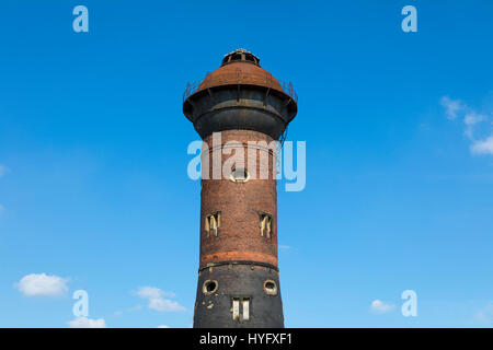 Industrial water tower at closed railway yard in Duisburg, Germany Stock Photo