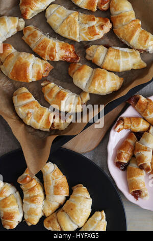 Food. Freshly baked croissants on the table Stock Photo