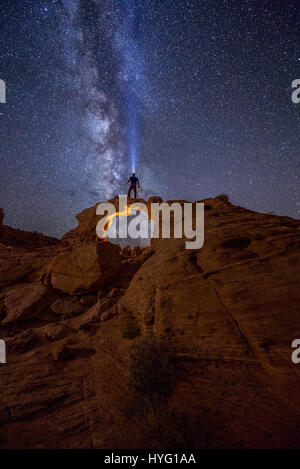 Milky Way Over Arsenic Arch in Central Utah. SPECTACULAR pictures of people exploring America’s most awe-inducing landscapes and star-lit night skies prove just how amazing this big country is. The stunning shots show people dwarfed by the sheer size of huge mountains and rocks while others show the Milky Way lit up in the dark of night. The images were taken by American photographer and owner of Action Photo Tours David Swindler (37) from Kanab in Utah. He took the astonishing pictures in an array of locations including the Grand Canyon, Vermillion Cliffs, Arizona and Zion National Park. Stock Photo