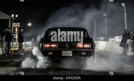 Camaro does a smoky burnout Stock Photo