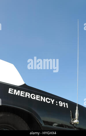 emergency 911 on the trunk of a US police car Stock Photo