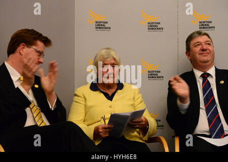 Iconic Liberal Democrat party figure Baroness Shirley Williams is applauded by Danny Alexander (L) and Alistair Carmichael (R) after speaking at a Scottish Liberal Democrat party rally in Edinburgh a week before the Scottish independence referendum Stock Photo