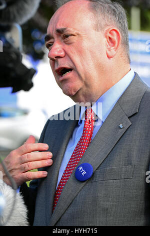 Scotland's First Minister Alex Salmond gives a TV interview after meeting football supporters in Dundee Stock Photo