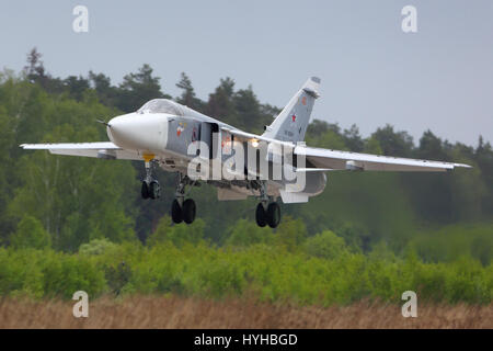 KUBINKA, MOSCOW REGION, RUSSIA - MAY 18, 2015: Sukhoi Su-24M bomber of russian air force landing at Kubinka air force base. Stock Photo