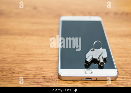 Keys are on the mobile phone Stock Photo