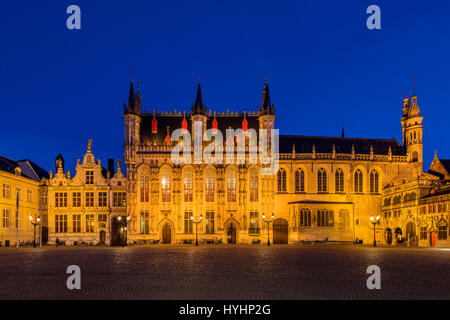 Night view of Burg square with Brugse Vrije building and Stadhuis or City Hall, Bruges, West Flanders, Belgium Stock Photo