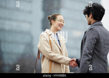 Business People  Greeting in Street Stock Photo