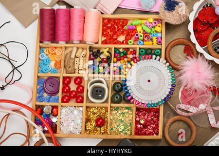 set of accessories and jewelry to embroidery, sewing accessories top view, seamstress workplace, many object for needlework, embroidery, handmade and  Stock Photo