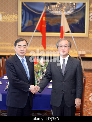 Tokyo, Japan. 4th Apr, 2017. Kong Xuanyou (L), China's assistant foreign minister, holds a regular meeting with Takeo Akiba, Japan's deputy foreign minister, in Tokyo, Japan, on April 4, 2017. Senior diplomats from China and Japan exchanged views on bilateral ties and a number of other issues of mutual concern at a regular meeting here on Tuesday. Credit: Ma Ping/Xinhua/Alamy Live News Stock Photo