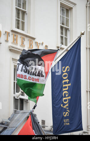 New Bond Street, London, UK. 4th Apr, 2017. Demonstrators stand outside Sotheby's auction house protesting against 'Israel blood diamonds' Credit: Matthew Chattle/Alamy Live News Stock Photo