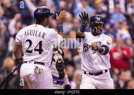 April 03, 2017: Milwaukee Brewers shortstop Jonathan Villar #5 is congratulated after scoring in the Major League Baseball game between the Milwaukee Brewers and the Colorado Rockies on opening day at Miller Park in Milwaukee, WI. John Fisher/CSM Stock Photo