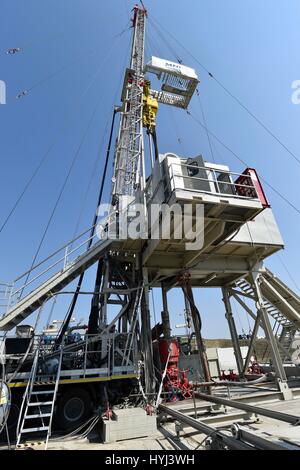 Zarosice, Czech Republic. 03rd Apr, 2017. Energy company MND extracted 127,000 cubic metres of crude oil last year, 10 percent less year-on-year, and 85.1 million cubic metres of natural gas, 20 percent less year-on-year, company representatives have said.The decline was caused by low prices of crude oil on global markets. MND started an exploratory drill in the oil deposit in Zarosice, Czech Republic, April 3, 2017. Credit: Vaclav Salek/CTK Photo/Alamy Live News Stock Photo