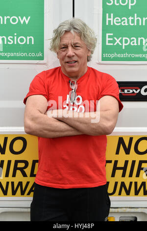 London, UK. 04th Apr, 2017. Neil Keveren starts out on his 400 mile walk from Harmondsworth to the Scottish Parliament in Edinburgh where he hopes to discuss their supoprt for a third runway at Heathrow Airport. He was joined at the start by Zac Goldsmith. Credit: Alan D West/Alamy Live News Stock Photo