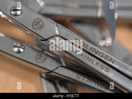 Frankfurt, Germany. 5th Apr, 2017. A falsified nail clip with the unauthorized term 'Solingen' is shown at the annual press conference of the customs office at the Frankfurt airport in Frankfurt, Germany, 5 April 2017. The main office secures forbidden objects of different offenses at a daily rate. Photo: Boris Roessler/dpa/Alamy Live News Stock Photo