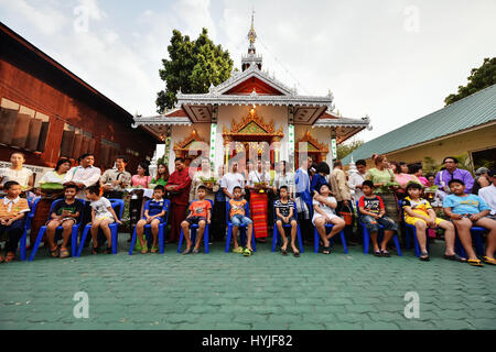 Mae Hong Son, Thailand. 5th April, 2017. Boys sitting in a half circle wait to have their hair shaven at the start of the Poi Sang Long novice monk ordination rituals at Wat Pang Lo in northern Thailand's Mae Hong Son, March 31, 2017. Considered as one of the biggest moments in a boy's life, the Poi Sang Long novice monk ordination rituals are held every year by the Shan peoples, also known as the Tai Yai, who mainly dwell in Myanmar and northern Thailand. Credit: Xinhua/Alamy Live News