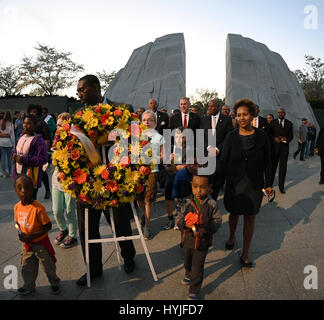 Washington DC, USA. 4th April 2017. U.S. Secretary of the Interior Ryan Zinke and Memorial Foundation CEO Harry Johnson Sr. during a wreath laying ceremony and candlelight vigil at the Martin Luther King Jr. Memorial April 4, 2017 in Washington, DC. The event marks the 49th anniversary of the assassination of King. Credit: Planetpix/Alamy Live News Stock Photo