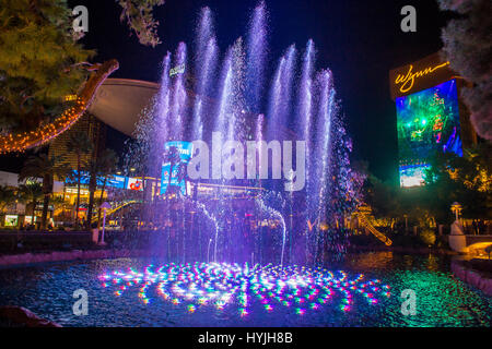 LAS VEGAS - JAN 15 : Fountains in front of the entrance to the Wynn Hotel and Casion on January 08, 2017 in Las Vegas. The hotel has 2,716 rooms and i Stock Photo