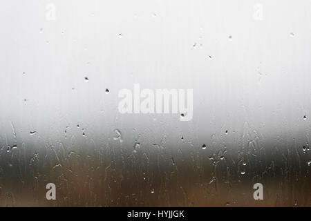 Close-up of raindrops on a window glass Stock Photo