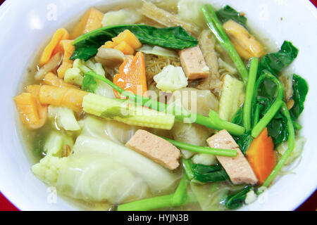 Fried noodle with sausage and many vegetables Stock Photo