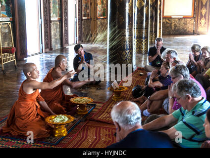 Monks carry out blessing at Oudong Buddhist Monastery in Kampong Speu Province Cambodia Stock Photo